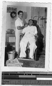 Local dentist with a patient, Carrillo Puerto, Quintana Roo, Mexico, 1947