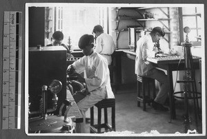 Moth examination, Guangzhou, Guangdong, China, 1927