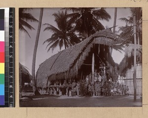 Group outside dubu, Delena, Papua New Guinea, ca. 1905/1915