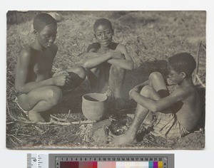 Boys cooking outside, Malawi, ca.1910