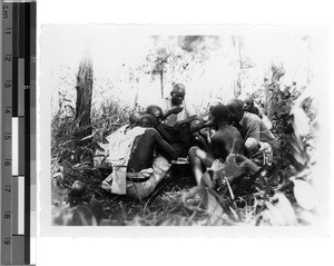 Wanyamwezi cooking and eating (2), East Africa