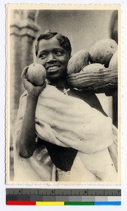 Woman with mangoes, India, ca.1920-1940