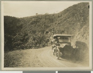 Dodge on narrow road, Eastern province, Kenya, July 1925