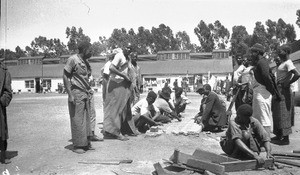 Street scene in a compound, Witwatersrand, South Africa