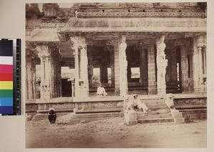 Men seated on temple steps and wall, Hampi, India, ca. 1880-1890