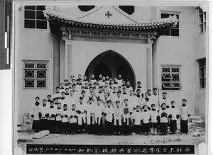 Maryknoll priests, men and boys at Meixien, China, 1948