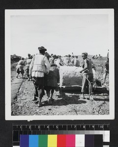 Men building road, China, ca. 1945
