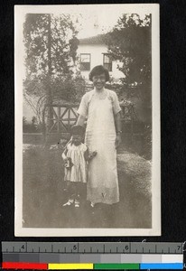 Chinese doctor with her adopted daughter, Shaoxing, Zhejiang, China,ca.1935-1945