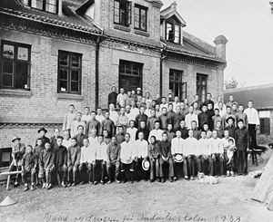 Men and boys who lived and worked at the Industrial School in Takushan. "Greetings from the peo