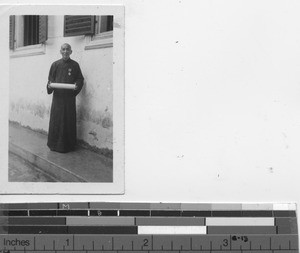 A cook with awards at Tsiaoliang, China, 1937