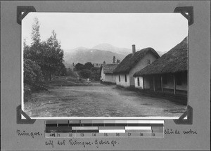 Mission buildings and Rungwe Mountains, Rungwe, Tanzania, ca. 1904-1914