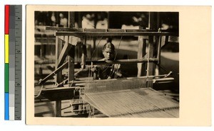 Girl weaving at a loom, India, ca.1920-1940