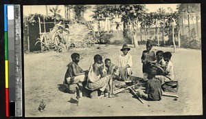 Boys preparing a meal, Kangu, Congo, ca.1920-1940