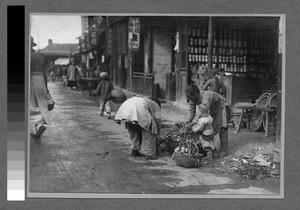 Street scene in factory village near Shanghai, China, ca.1920-1930