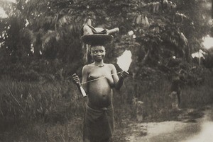 Woman spinning cotton, Nigeria, ca. 1932