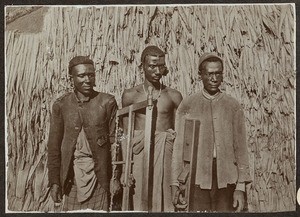 Three workers, Tanzania, ca.1900-1910