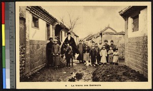 Missionary father visits a village, China, ca.1920-1940