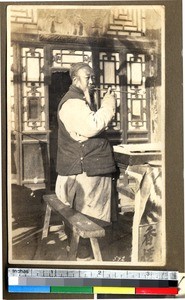 Portly man with pipe, Beijing, China, ca.1931-1934