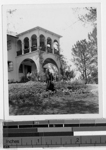 Father Austin Hannon, MM, walking in front of Maryknoll Sisters convent, Baguio, Philippines, 1936