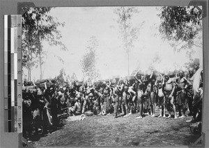 Men and women carrying bricks, Kyimbila, Tanzania, 1898-1914