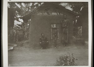 The door of an African hut in comparison with the size of an adult