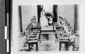 Orphans eating a meal, Loting, China, ca. 1920