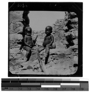 Two babies in a hole within the wall, South Africa East