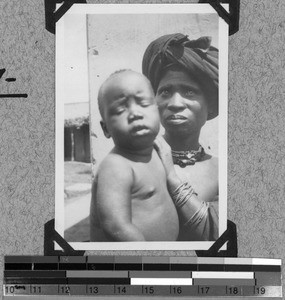 Tembu woman with a sick child in Baziya, South Africa East