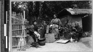 Grinding grain, Tokyo, Japan, ca. 1920-1940