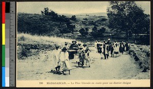 People carrying two missionary fathers on sedan chairs, Madagascar, ca.1920-1940