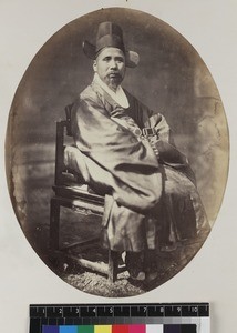 Portrait of Taoist priest in ceremonial robes, Beijing, China, ca. 1861-1864