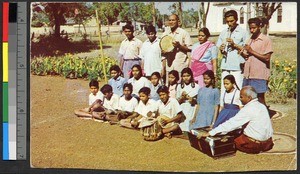 Children at a leprosarium playing musical instruments, Chandkhuri, India, ca.1920-1940