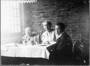 Missionary Blumer and his family having coffee, Arusha, Tanzania, 1927