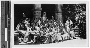 Maryknoll Sisters seated on the stairs of Sacred Heart Church, Punahou, Honolulu, Hawaii, 1927