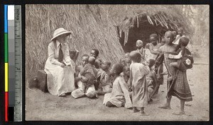 Students and teacher outdoors, Zanzibar, Tanzania, ca. 1920-1940