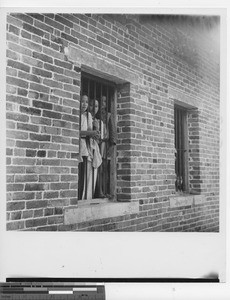 A family trapped by floods at Wuzhou, China, 1950