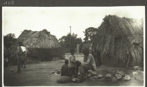 Camp for criminals in Betgeri. Life around the huts