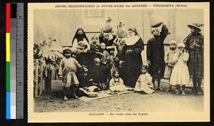 Women and children standing with missionary sisters in a Coptic home, Zagazig, Egypt, ca.1920-1940