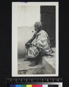 Man smoking pipe, Ghana, 1926