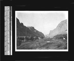 Traveling through a riverbed, Gansu Province, China, ca.1926