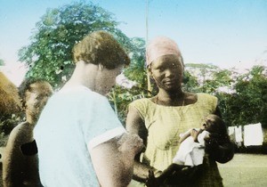 Female missionary, mother and baby, Congo, ca. 1920-1930