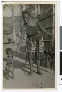 African woman holding a baby on her hand, South Africa