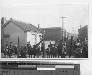 A crowd outside the Academy at Dalian, China