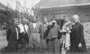 Delegates from the Women Teacher Missionary Confederation at a conference The picture shows amo