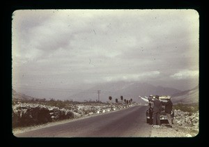 Three men on a road