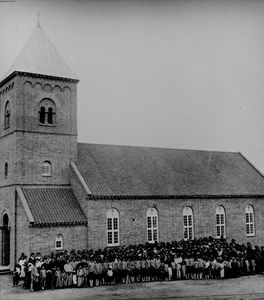 Manchuria, the 1930s. Fuyu (Petune). The church opened in 1938. Missionary Norgaard is seen in