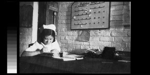 A nurse in the hospital office, Chengdu, Sichuan, China, ca.1946