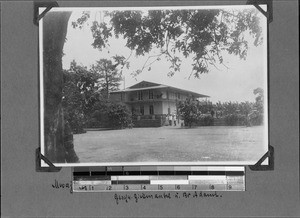 Missionaries Zickmantel and Adami in front of a house, Mwaya, Tanzania, ca. 1897-1922