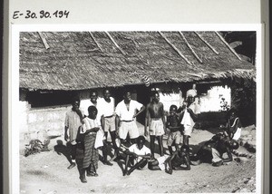 Manyemen. Schoolboys playing in front of their dormitory