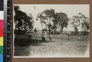 Agricultural workers in field, Kambole Mission, Zambia, ca. 1925